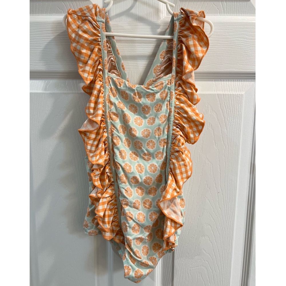 Girls square neck, ruffled cross back boutique bathing suit. Size 7-8.